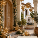 Spanish style Christmas entry with glowing gold stars champagne ribbon white poinsettias and carved wooden door