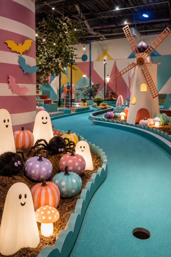 cute Halloween ghosts on putt-putt golf course