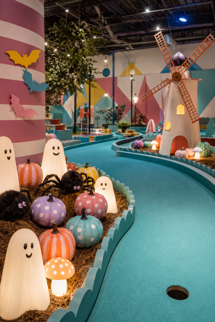 cute Halloween ghosts on putt-putt golf course