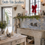 Delft Tile Scullery Christmas scene with red bow rustic stone basin