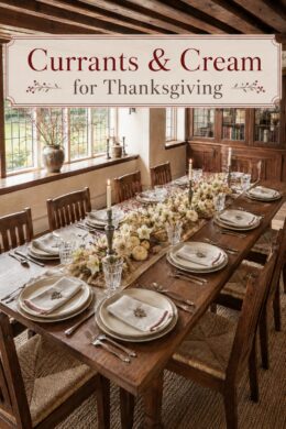 long wood Thanksgiving table with berry stems white pumpkins candlelight and handcrafted place settings