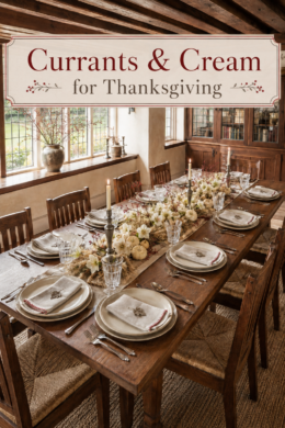 long wood Thanksgiving table with berry stems white pumpkins candlelight and handcrafted place settings