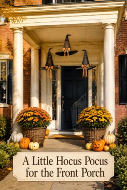 Colonial Halloween entry with hanging witch hats and harvest flowers beneath text reading A Little Hocus Pocus for the Front Porch