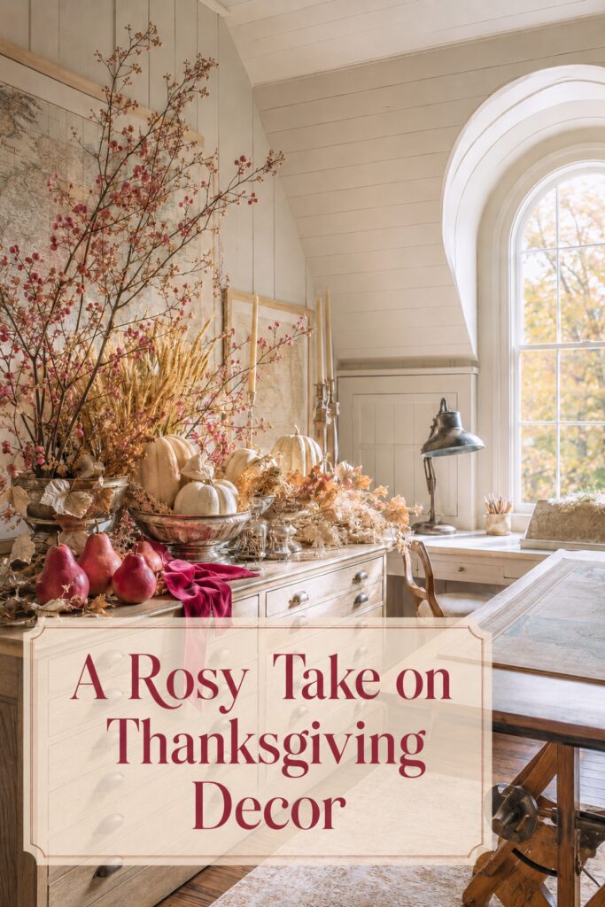 Sunlit vintage map room with a pear and pumpkin harvest display and an overlay reading A Rosy Take on Thanksgiving Decor