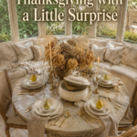 Neutral Thanksgiving table with pear place settings and a pheasant centerpiece beneath text reading Thanksgiving with a Little Surprise